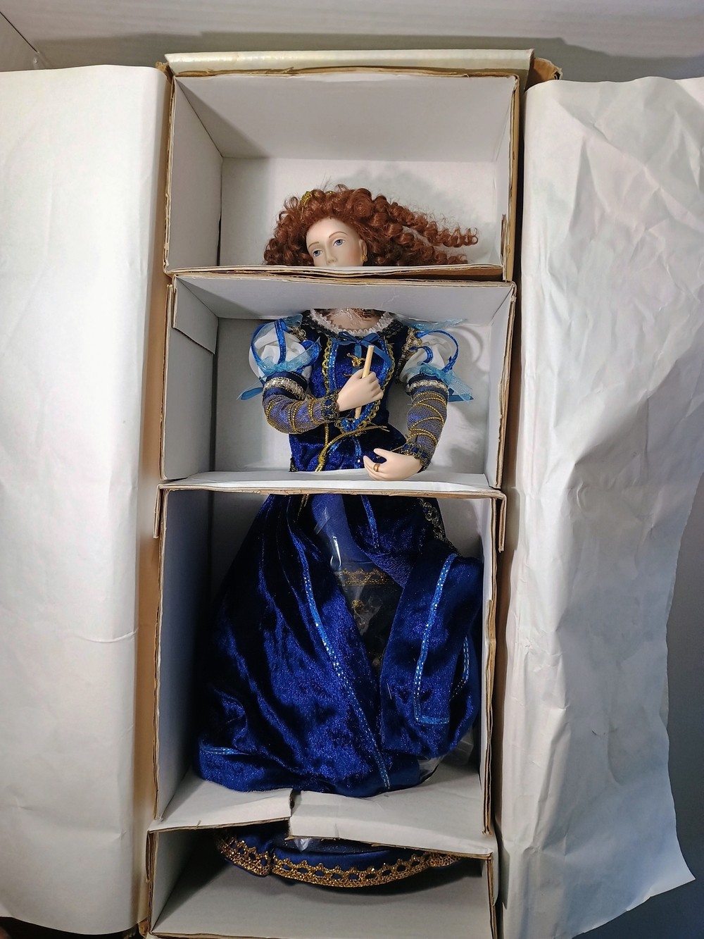 Handcrafted Porcelain Figurine in Deep Blue Dress